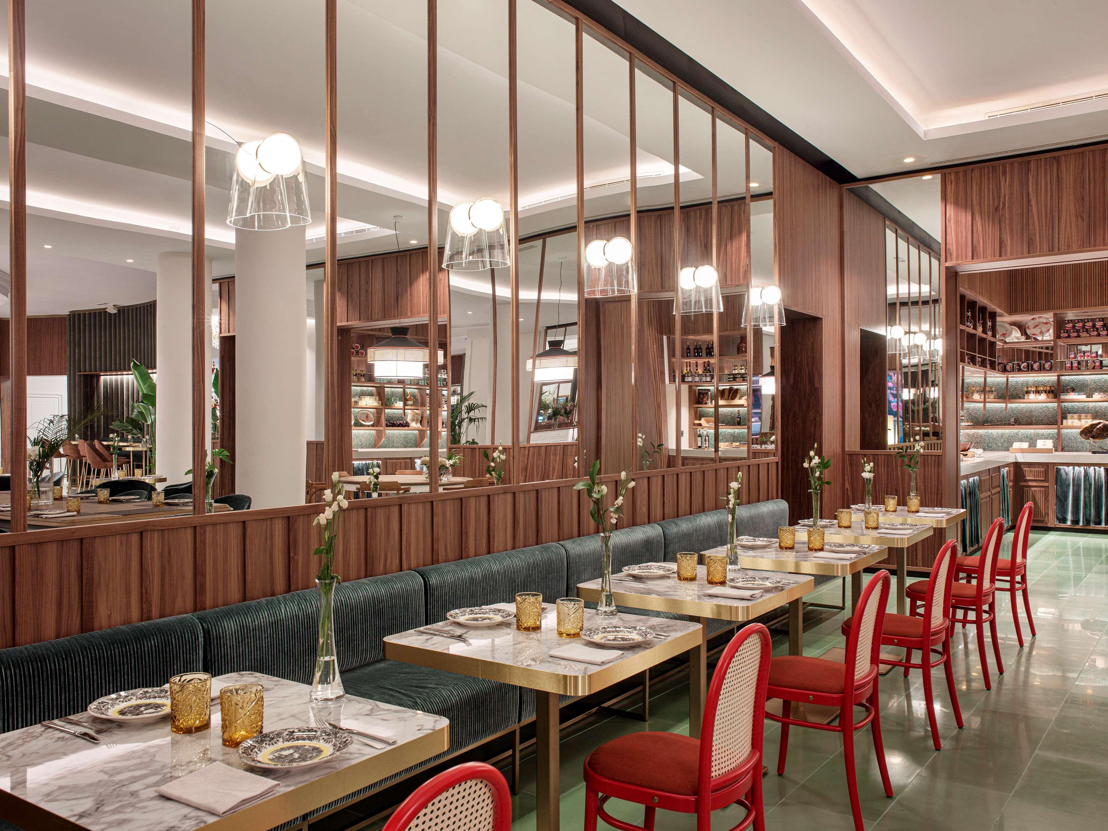 فندق كولون جران ميليا إشبيلية المظهر الخارجي الصورة The interior of the restaurant